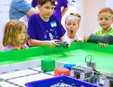 Children Engaged in Robotics STEM Activity