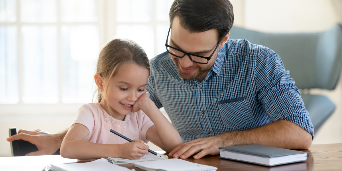 A child being taught STEM from her parent at home.